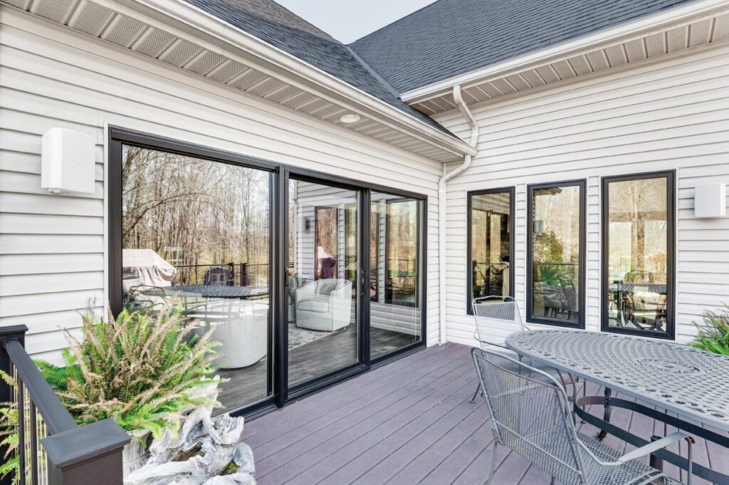 Bright sunroom with floor-to-ceiling windows