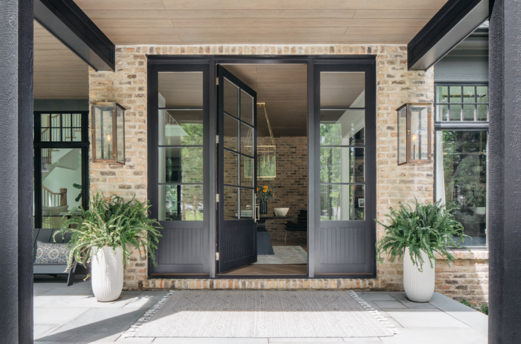 Craftsman-style front entry with stone accents