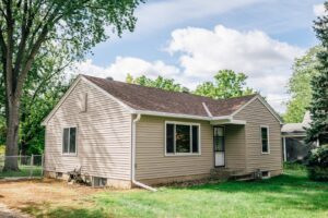A home with new tan siding
