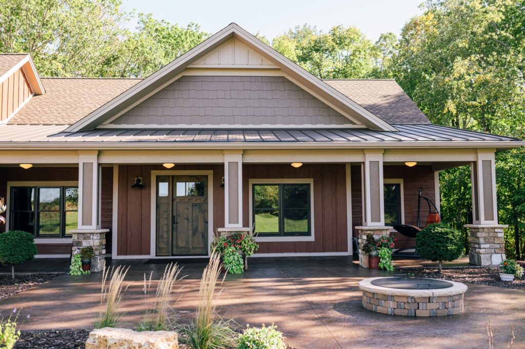 Craftsman-style home exterior with covered porch and warm wood tones