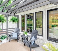 Screened-in porch with outdoor seating